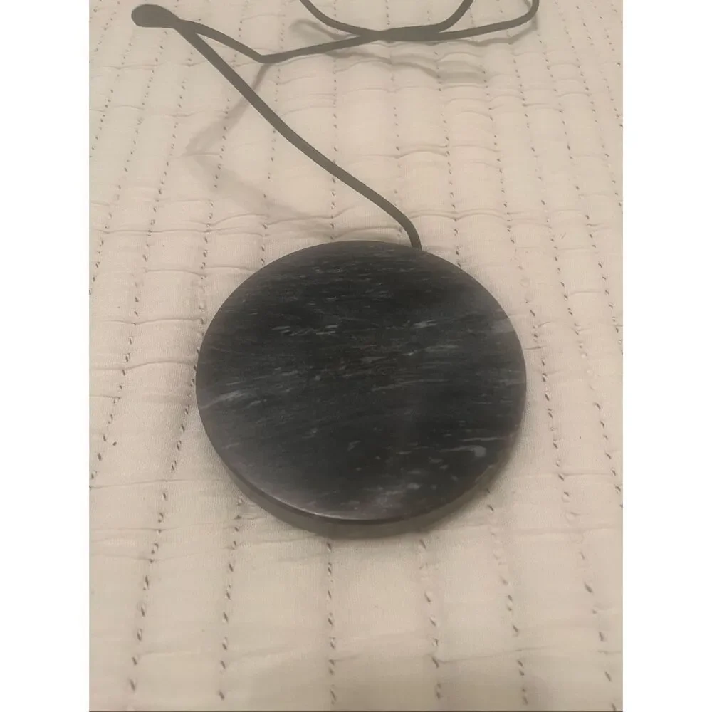 Einova Classic Stone marble wireless charging pad.
